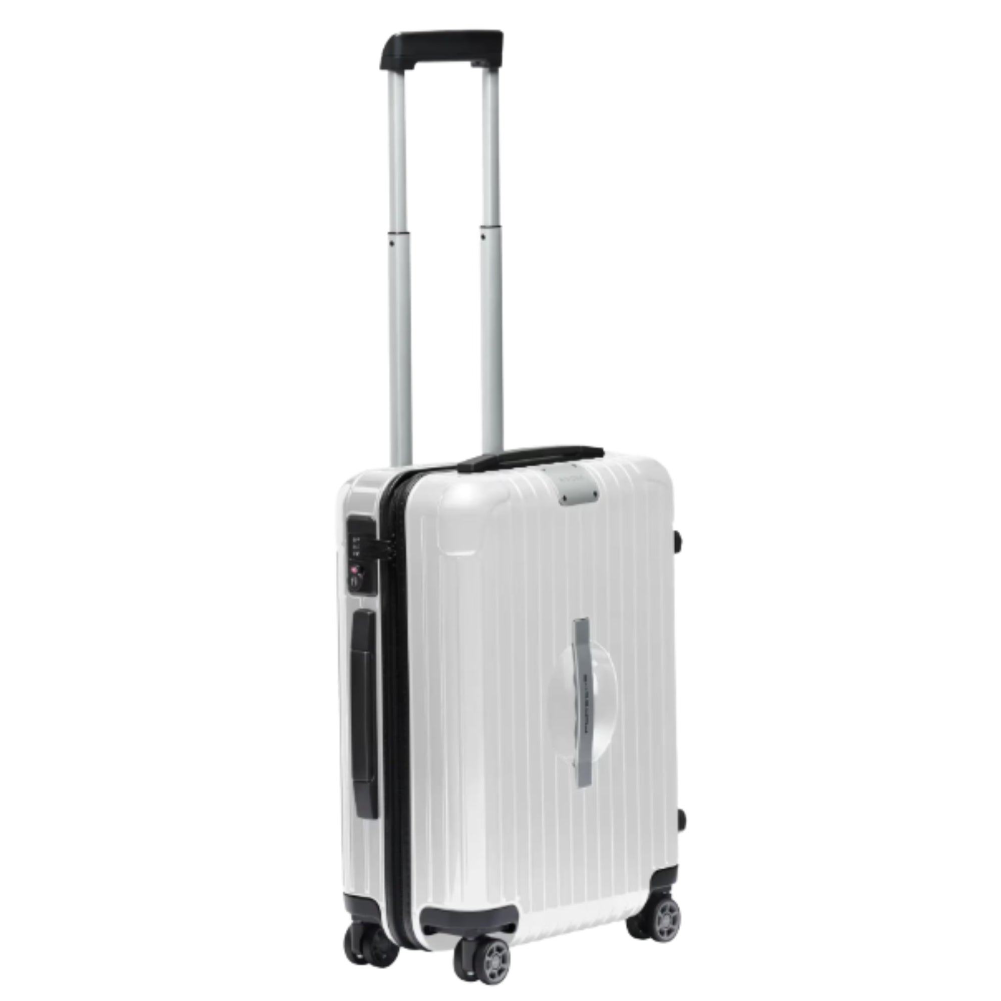 Detalle logo Porsche en maleta Rimowa blanca luxury travel edition